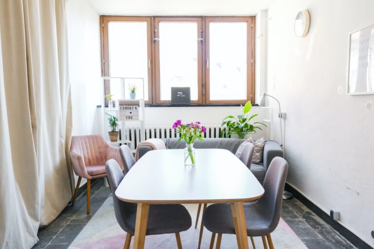 brown wooden table near wall